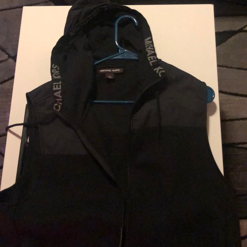 Micheal Kor’s performance vest